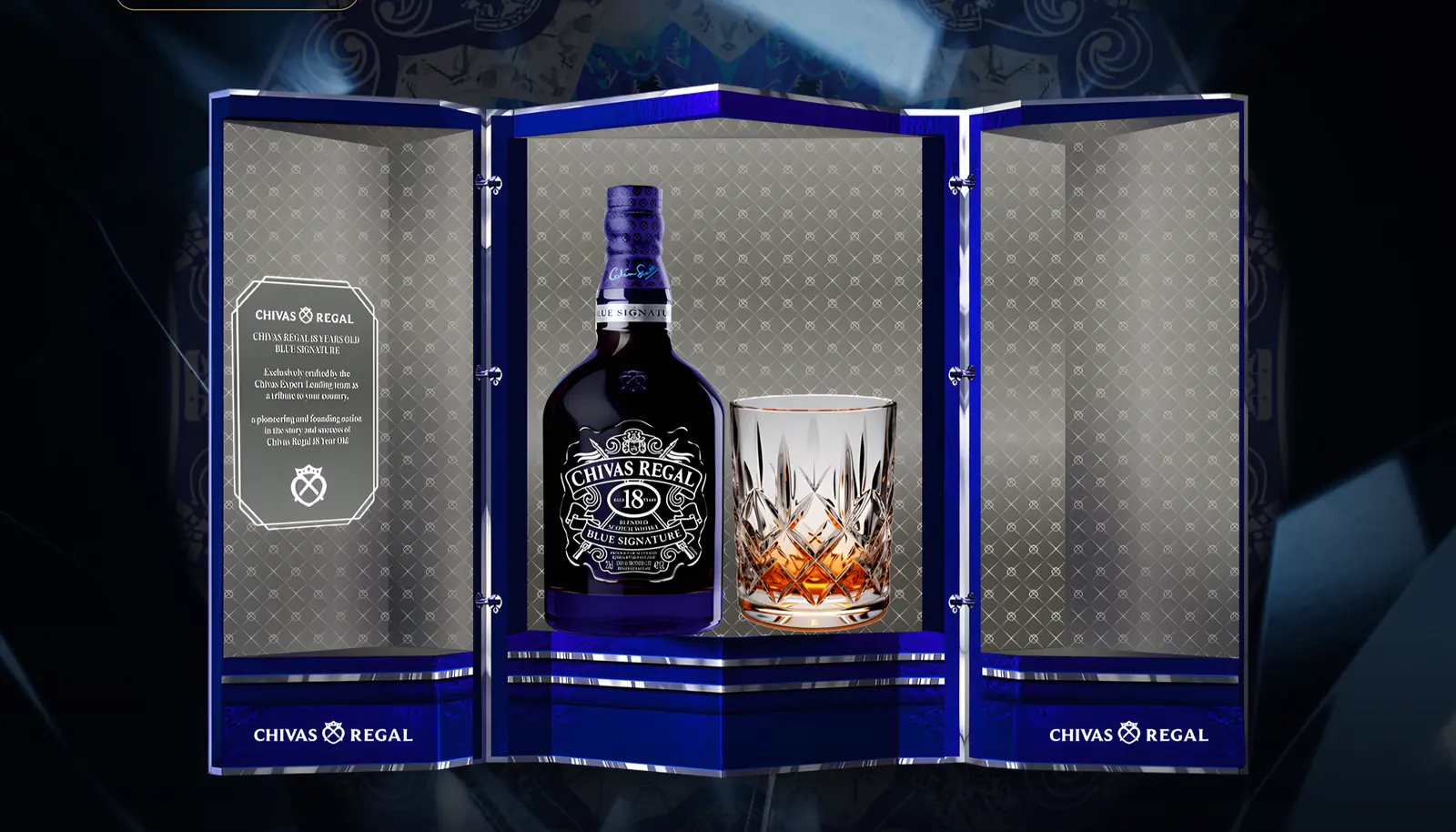 The 18 Blue Signature Tết 2026 gift set open, bottle and tumbler inside a blue kaleidoscope case